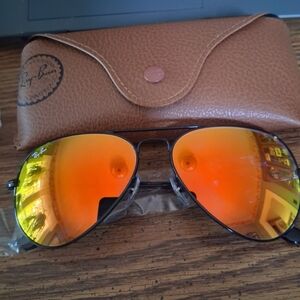 Ray-Ban Aviator Sunglasses with Orange/Yellow Mirrored Lenses And Black Frame.